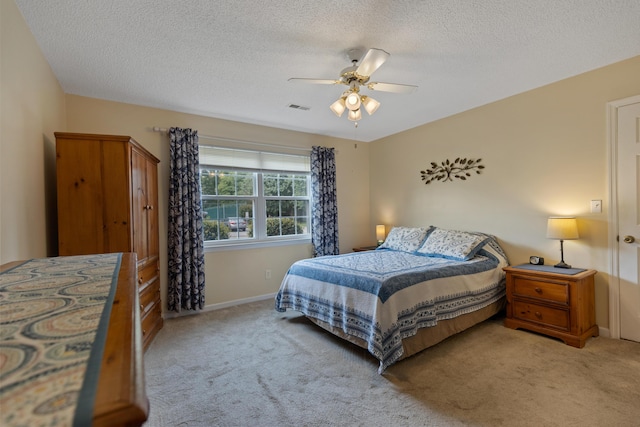 6755 Hickory Creek Rd, Chattanooga, TN 37421 - carpeted bedroom featuring a textured ceiling, baseboards, and ceiling fan