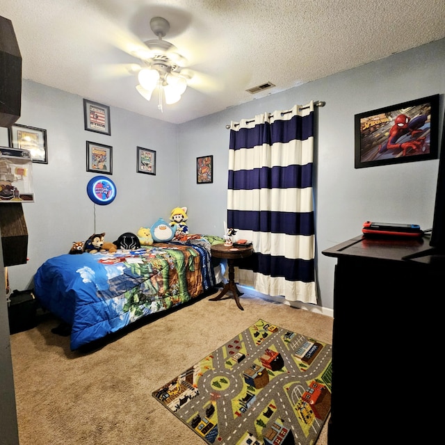 1610 Castleberry Ave, Chattanooga, TN 37412 - carpeted bedroom featuring a ceiling fan and a textured ceiling