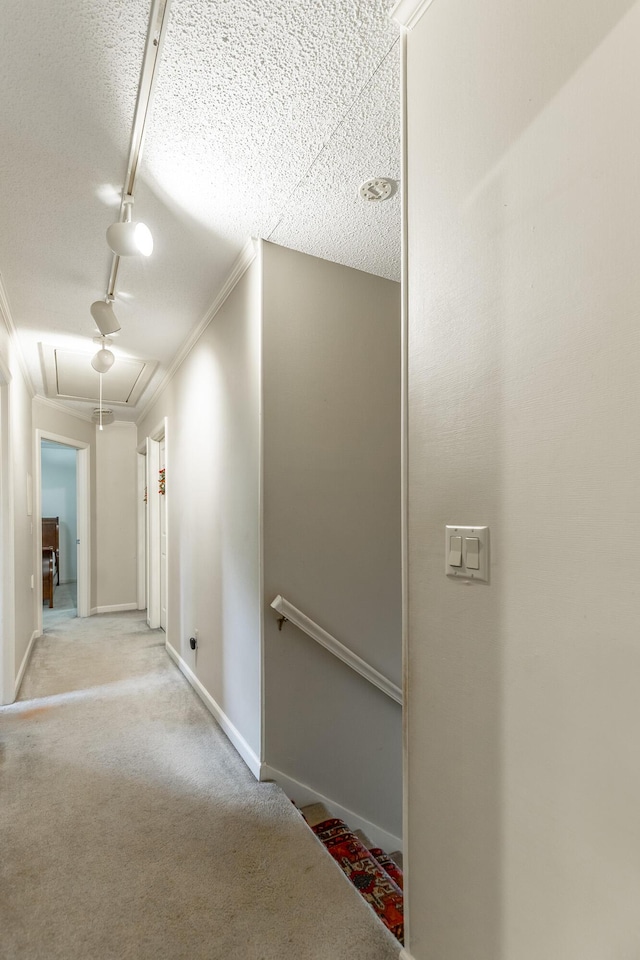 1820 Colonial Way Cir, Hixson, TN 37343 - hallway featuring attic access, an upstairs landing, ornamental molding, rail lighting, and baseboards