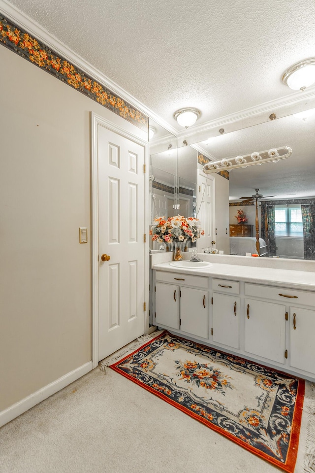 1820 Colonial Way Cir, Hixson, TN 37343 - bathroom featuring a textured ceiling, vanity, crown molding, and baseboards
