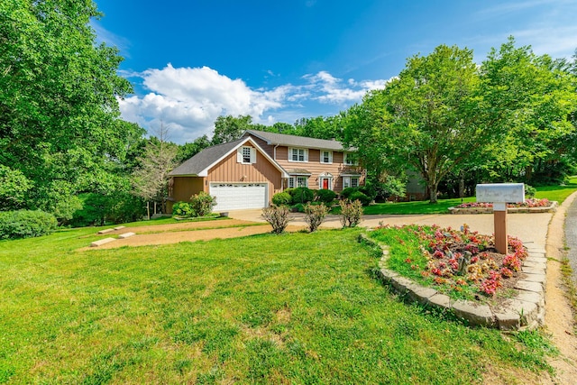 1820 Colonial Way Cir, Hixson, TN 37343 - view of front of house with a garage, a front lawn, driveway, and board and batten siding