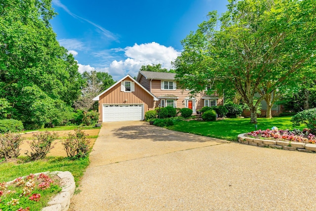 1820 Colonial Way Cir, Hixson, TN 37343 - view of front of property featuring driveway, a front yard, board and batten siding, and a garage