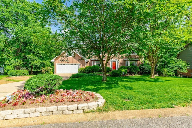 1820 Colonial Way Cir, Hixson, TN 37343 - view of property hidden behind natural elements with an attached garage, a front lawn, and concrete driveway
