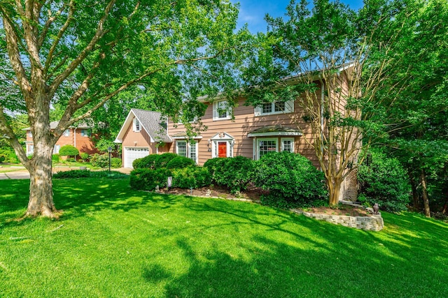 1820 Colonial Way Cir, Hixson, TN 37343 - colonial home with a front lawn and a garage
