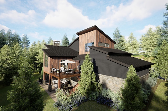 0 Moorehead Ln, Winchester, TN 37398 - view of side of home with a patio, a deck, metal roof, and stone siding