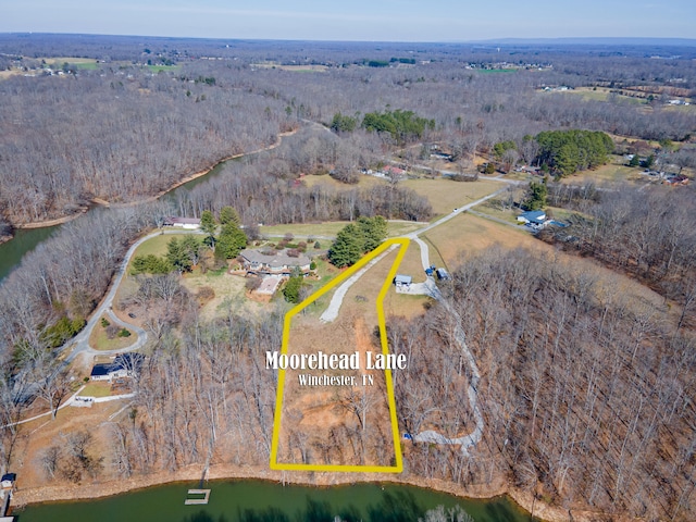 0 Moorehead Ln, Winchester, TN 37398 - view of property location featuring property parcel outlined, a heavily wooded area, and a nearby body of water