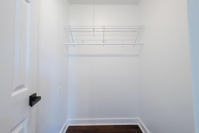 4407 Bennett Rd, Chattanooga, TN 37412 - walk in closet with dark wood-style flooring