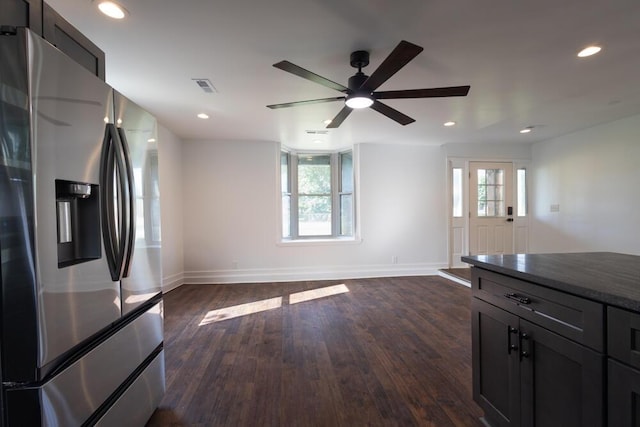 4407 Bennett Rd, Chattanooga, TN 37412 - kitchen with stainless steel fridge, dark wood finished floors, a ceiling fan, recessed lighting, and dark countertops
