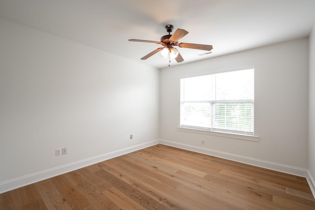8539 Lexie Ln, Ooltewah, TN 37363 - empty room featuring ceiling fan and light wood-style flooring