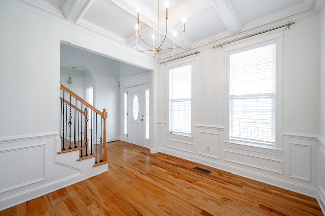 8539 Lexie Ln, Ooltewah, TN 37363 - entrance foyer featuring coffered ceiling, a chandelier, beamed ceiling, light wood-type flooring, and stairway