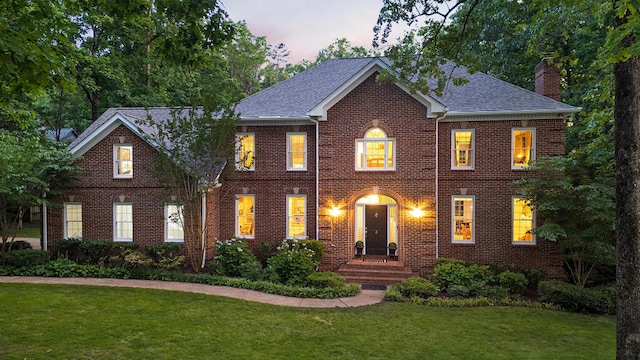 3 Chamblee Ct, Signal Mountain, TN 37377 - colonial home featuring a chimney, a front yard, brick siding, and a shingled roof
