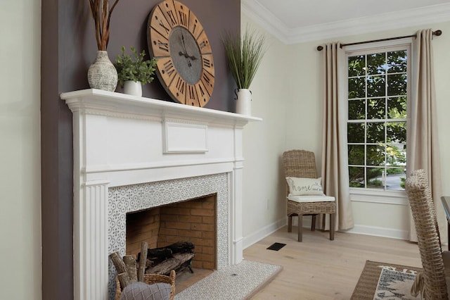 3 Chamblee Ct, Signal Mountain, TN 37377 - living area featuring light wood-style floors, a fireplace, and ornamental molding