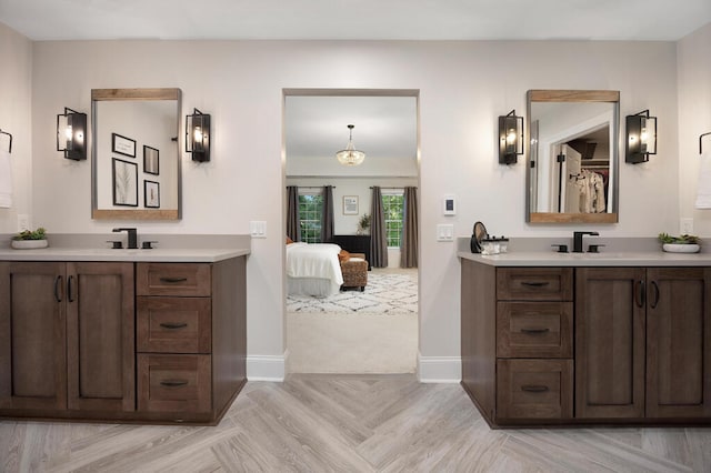 3 Chamblee Ct, Signal Mountain, TN 37377 - ensuite bathroom with two vanities and baseboards