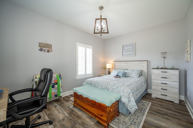 421 Coahulla Creek Dr, Dalton, GA 30721 - bedroom with a chandelier, a desk, baseboards, and wood finished floors