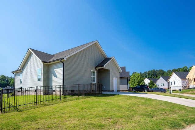 421 Coahulla Creek Dr, Dalton, GA 30721 - view of property exterior featuring driveway, roof with shingles, and crawl space