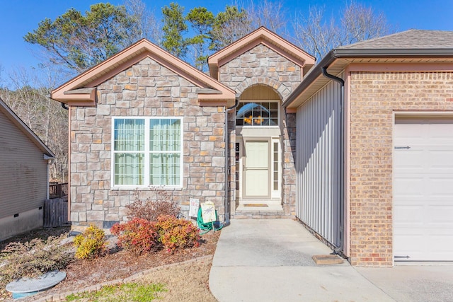 2367 Lake Mist Dr, Chattanooga, TN 37421 - doorway to property with stone siding and a garage