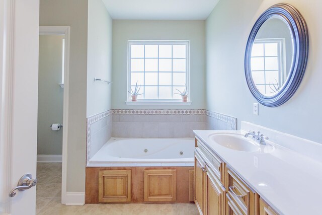 2367 Lake Mist Dr, Chattanooga, TN 37421 - bathroom with vanity, healthy amount of natural light, a whirlpool tub, and tile patterned floors