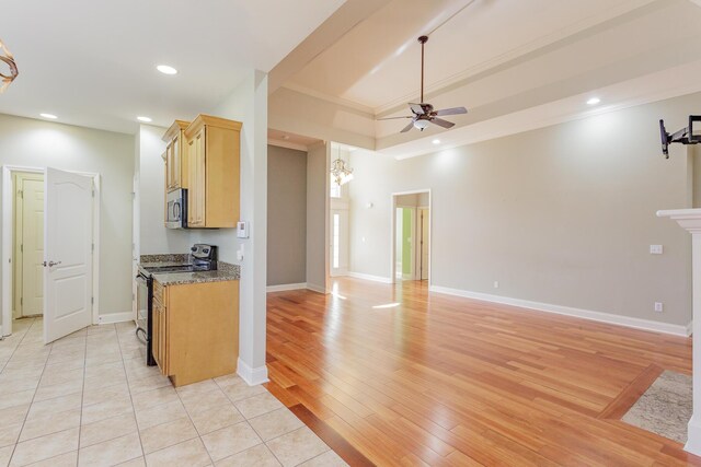 2367 Lake Mist Dr, Chattanooga, TN 37421 - kitchen featuring electric range, stainless steel microwave, ceiling fan, light wood-type flooring, and crown molding
