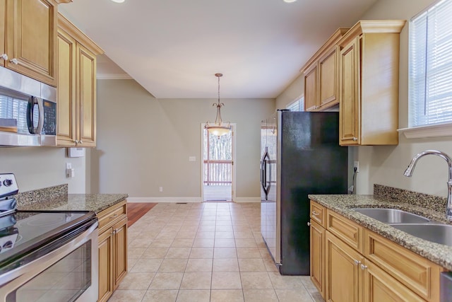 2367 Lake Mist Dr, Chattanooga, TN 37421 - kitchen with stainless steel appliances, light tile patterned floors, a chandelier, recessed lighting, and light stone counters