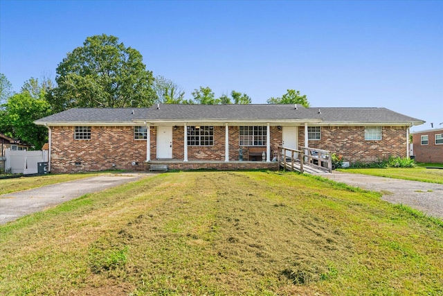 1307 Park Forrest Dr, Fort Oglethorpe, GA 30742 - ranch-style home with a front yard, brick siding, a porch, and crawl space