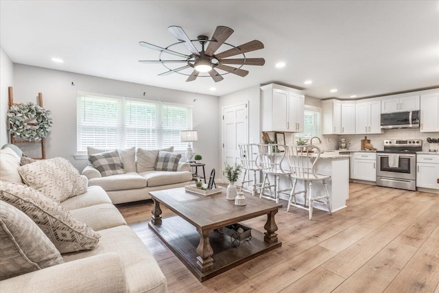 918 Old Lafayette Rd, Chickamauga, GA 30707 - living area featuring ceiling fan, plenty of natural light, recessed lighting, and light wood-style flooring