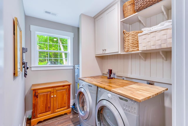 168 Middle Rd, Lookout Mountain, GA 30750 - laundry room featuring cabinet space, separate washer and dryer, and wood finished floors