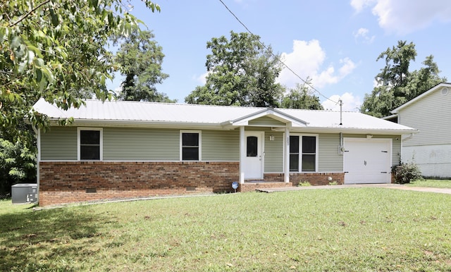 503 Kirby Dr, Cleveland, TN 37323 - view of front of home with an attached garage, brick siding, a front lawn, crawl space, and a metal roof