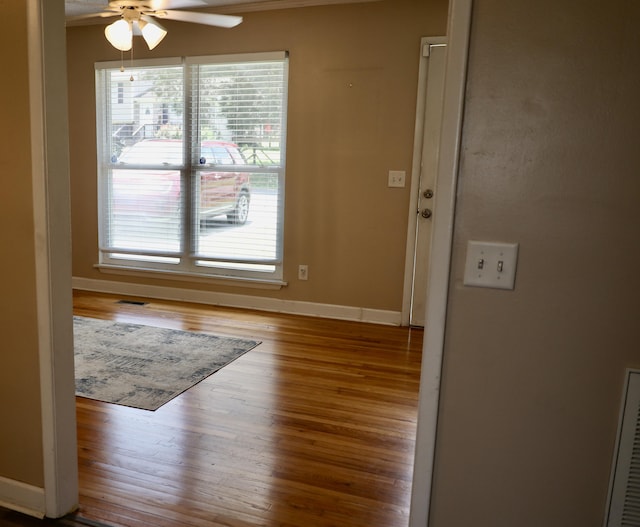 503 Kirby Dr, Cleveland, TN 37323 - unfurnished dining area featuring ceiling fan, wood finished floors, and crown molding