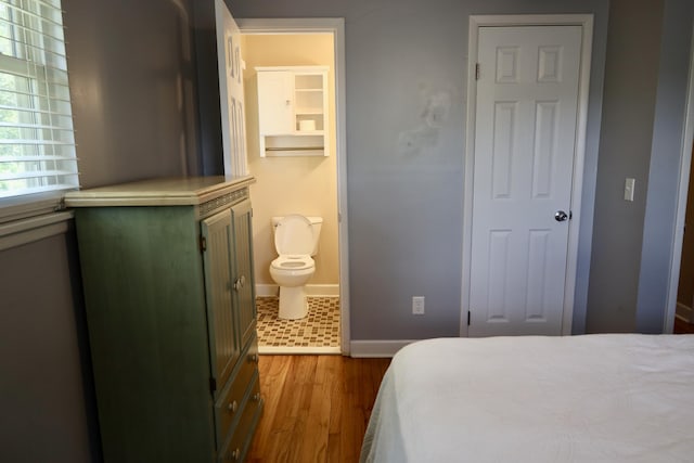 503 Kirby Dr, Cleveland, TN 37323 - bedroom featuring wood finished floors and ensuite bath
