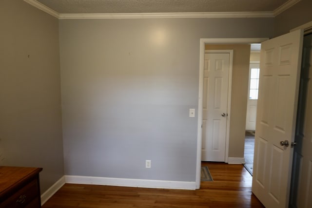 503 Kirby Dr, Cleveland, TN 37323 - unfurnished room with dark wood-type flooring, ornamental molding, and a textured ceiling