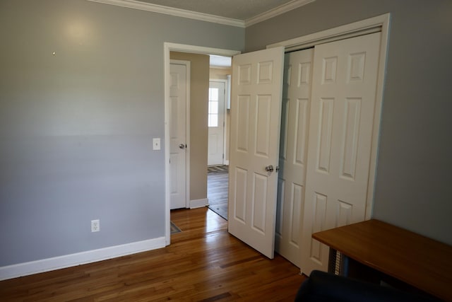 503 Kirby Dr, Cleveland, TN 37323 - unfurnished bedroom featuring ornamental molding, wood finished floors, and a closet