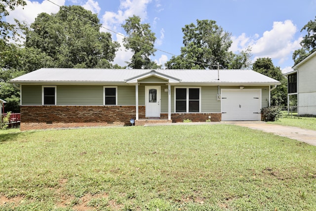 503 Kirby Dr, Cleveland, TN 37323 - ranch-style house featuring a garage, brick siding, concrete driveway, and a metal roof