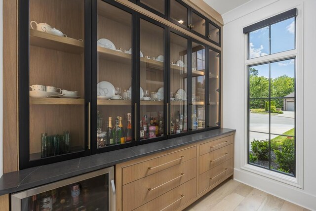 3634 Falkirk Way, Ooltewah, TN 37363 - indoor dry bar featuring beverage cooler and light wood-style flooring