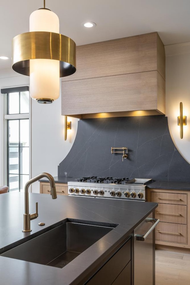 3634 Falkirk Way, Ooltewah, TN 37363 - kitchen featuring dark countertops, decorative backsplash, modern cabinets, recessed lighting, and cooktop