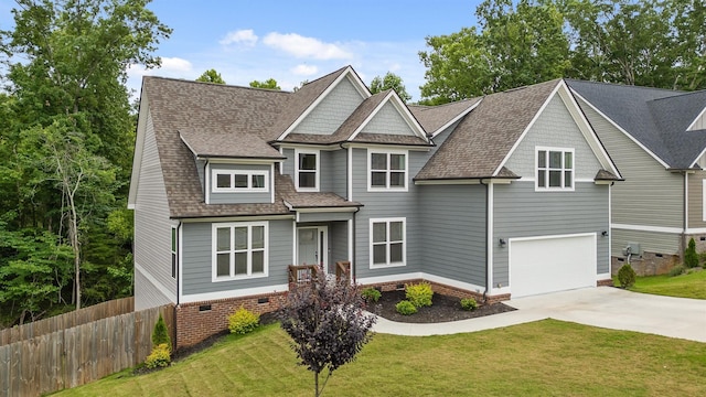 6434 Satjanon Dr, Ooltewah, TN 37363 - view of front facade featuring driveway, an attached garage, crawl space, and a shingled roof