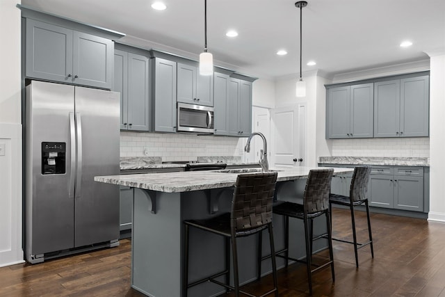 6434 Satjanon Dr, Ooltewah, TN 37363 - kitchen featuring stainless steel appliances, gray cabinetry, backsplash, dark wood-type flooring, and recessed lighting