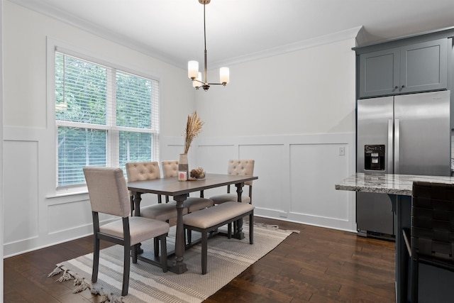 6434 Satjanon Dr, Ooltewah, TN 37363 - dining area featuring a decorative wall, crown molding, dark wood finished floors, a wainscoted wall, and a chandelier