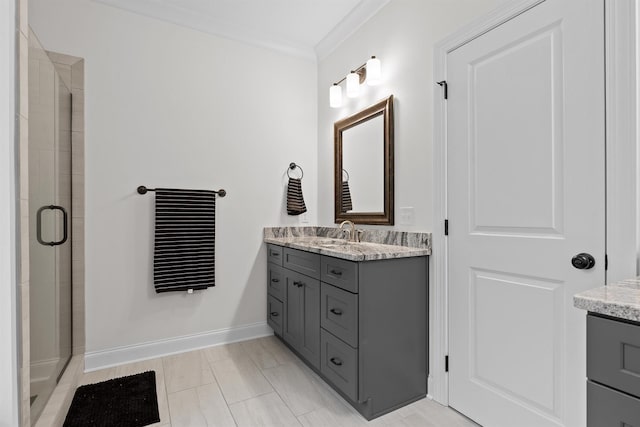 6434 Satjanon Dr, Ooltewah, TN 37363 - bathroom featuring vanity, a shower stall, and ornamental molding