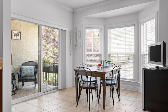 1008 Renaissance Ct, Chattanooga, TN 37419 - dining space featuring healthy amount of natural light, light tile patterned flooring, and crown molding