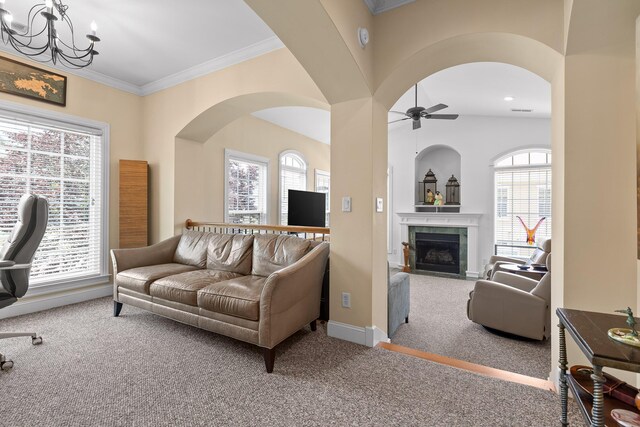 1008 Renaissance Ct, Chattanooga, TN 37419 - living area featuring carpet, a ceiling fan, a chandelier, a fireplace, and crown molding