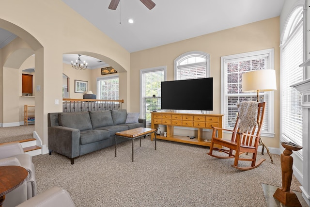 1008 Renaissance Ct, Chattanooga, TN 37419 - living room featuring carpet, a ceiling fan, plenty of natural light, arched walkways, and lofted ceiling