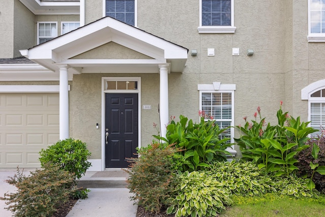 1008 Renaissance Ct, Chattanooga, TN 37419 - doorway to property featuring stucco siding and a garage
