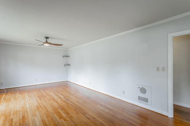 105 Joyce Ave, Red Bank, TN 37415 - spare room featuring hardwood / wood-style flooring, heating unit, crown molding, and a ceiling fan