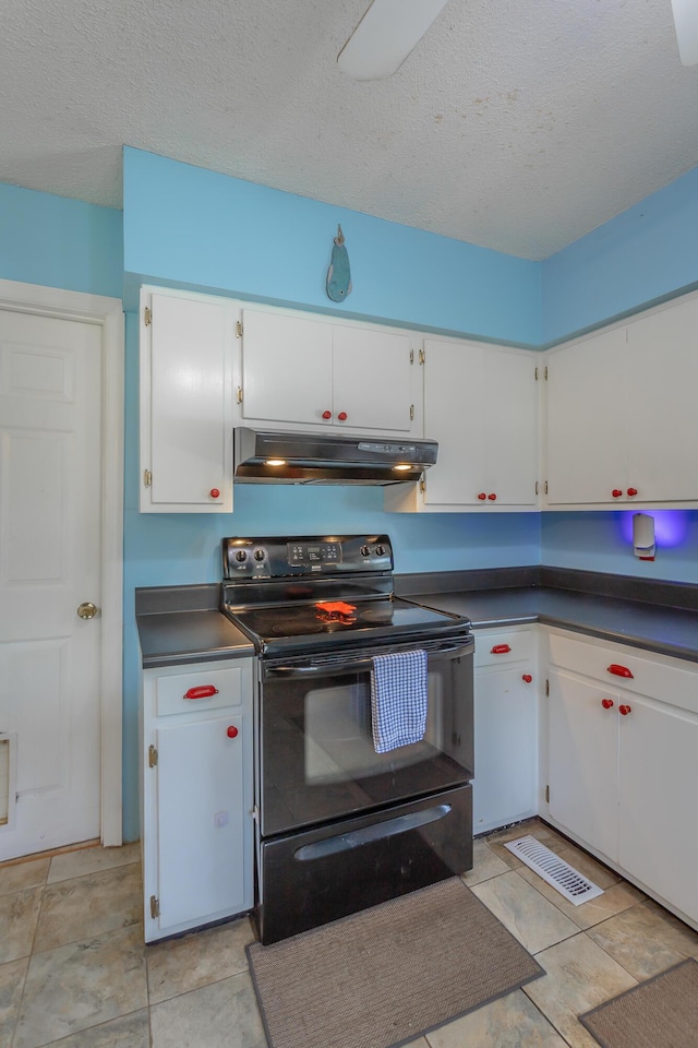 105 Joyce Ave, Red Bank, TN 37415 - kitchen with black electric range oven, under cabinet range hood, white cabinetry, a textured ceiling, and dark countertops