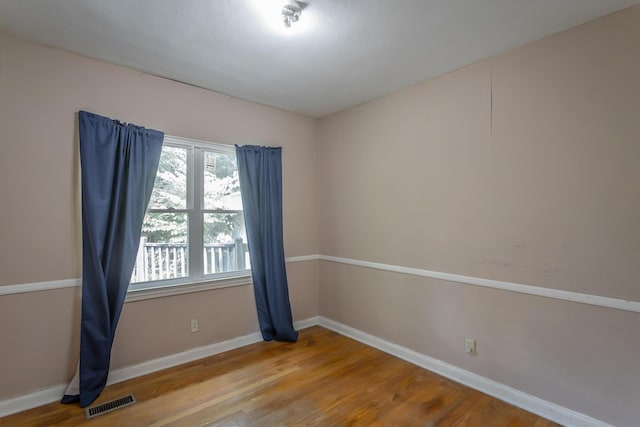 105 Joyce Ave, Red Bank, TN 37415 - unfurnished room with wood finished floors and baseboards