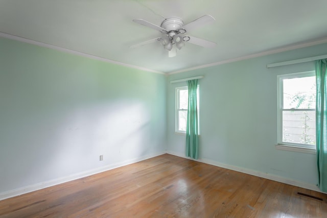 105 Joyce Ave, Red Bank, TN 37415 - unfurnished room featuring wood finished floors, crown molding, and ceiling fan