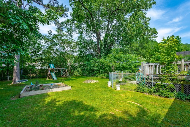 105 Joyce Ave, Red Bank, TN 37415 - view of yard featuring a playground and a garden
