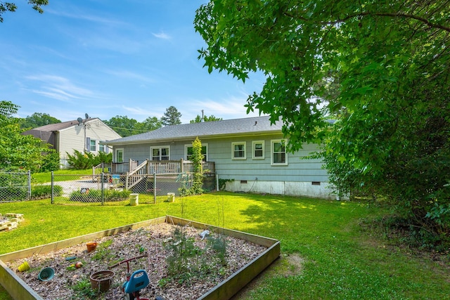 105 Joyce Ave, Red Bank, TN 37415 - rear view of property with a garden, crawl space, and a wooden deck