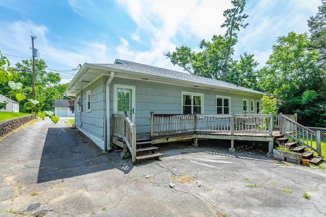 105 Joyce Ave, Red Bank, TN 37415 - view of front of property featuring a wooden deck and roof with shingles