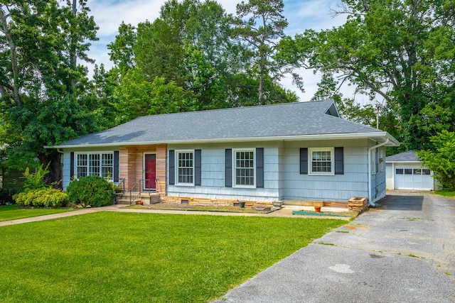 105 Joyce Ave, Red Bank, TN 37415 - ranch-style home with an outbuilding, a shingled roof, a garage, a front lawn, and crawl space